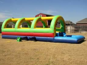 Slipan d Dip rentals in Central Texas, Central Texas slip and dip rentals, inflatable water slides for rent in Central Texas.